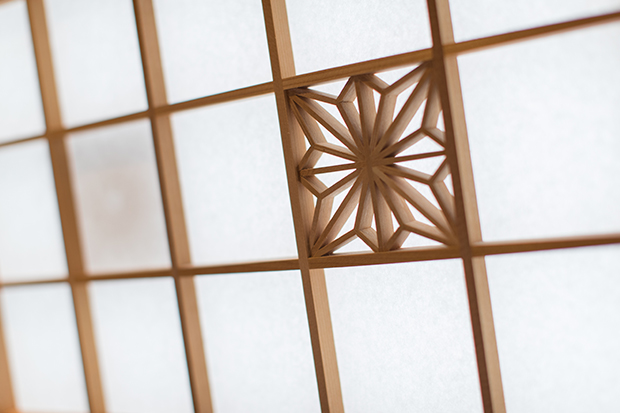 Guest Room / The sliding paper door screen decorated with Kumiko Crafting, a traditional Japanese art.